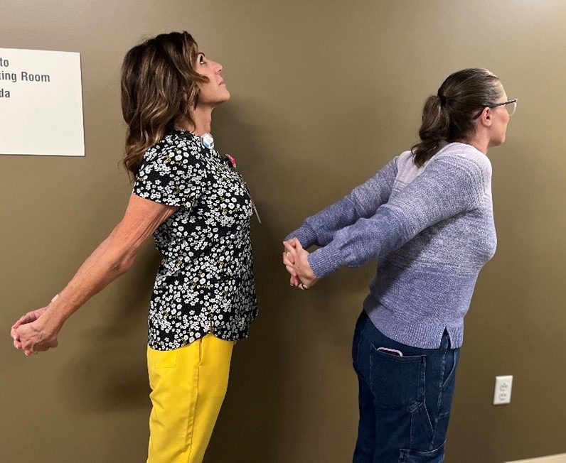 Standing Shoulder and Chest Stretch